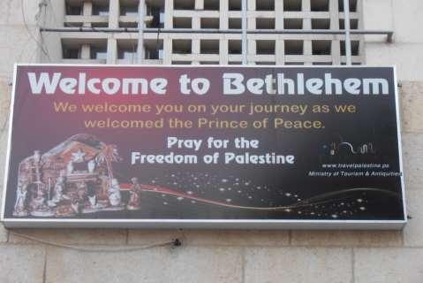 [Arrive at the church Manger Square, a large paved courtyard in front of the Church. Walk to the Church of the Nativity] http://en.wikipedia.org/wiki/church_of_the_nativity Sign: Welcome to Bethlehem.