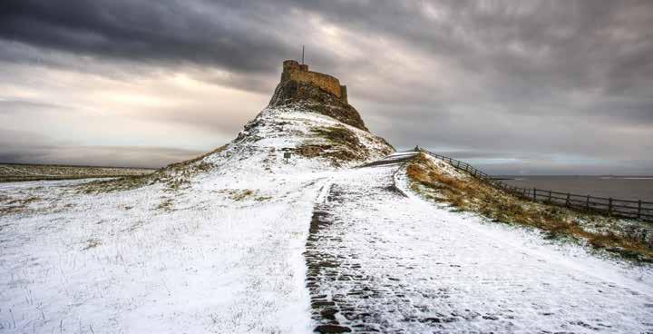 DECEMBER Holy Family F Jesus is presented in the Temple. Lk.:-0 A light dusting of snow on the ground at Lindisfarne Castle, Holy Island, Berwick-upon-Tweed, Northumberland, England.