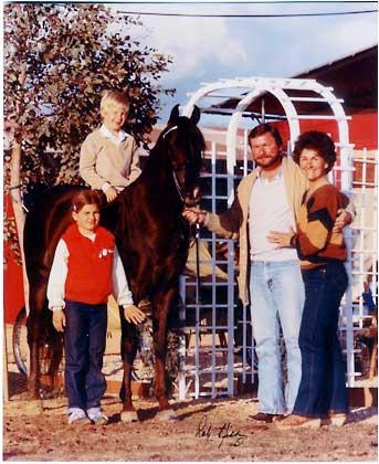 Family photo of Chino Hills family Doug, Peggy and Jessica Ryen and eight-year-old Joshua Ryen,