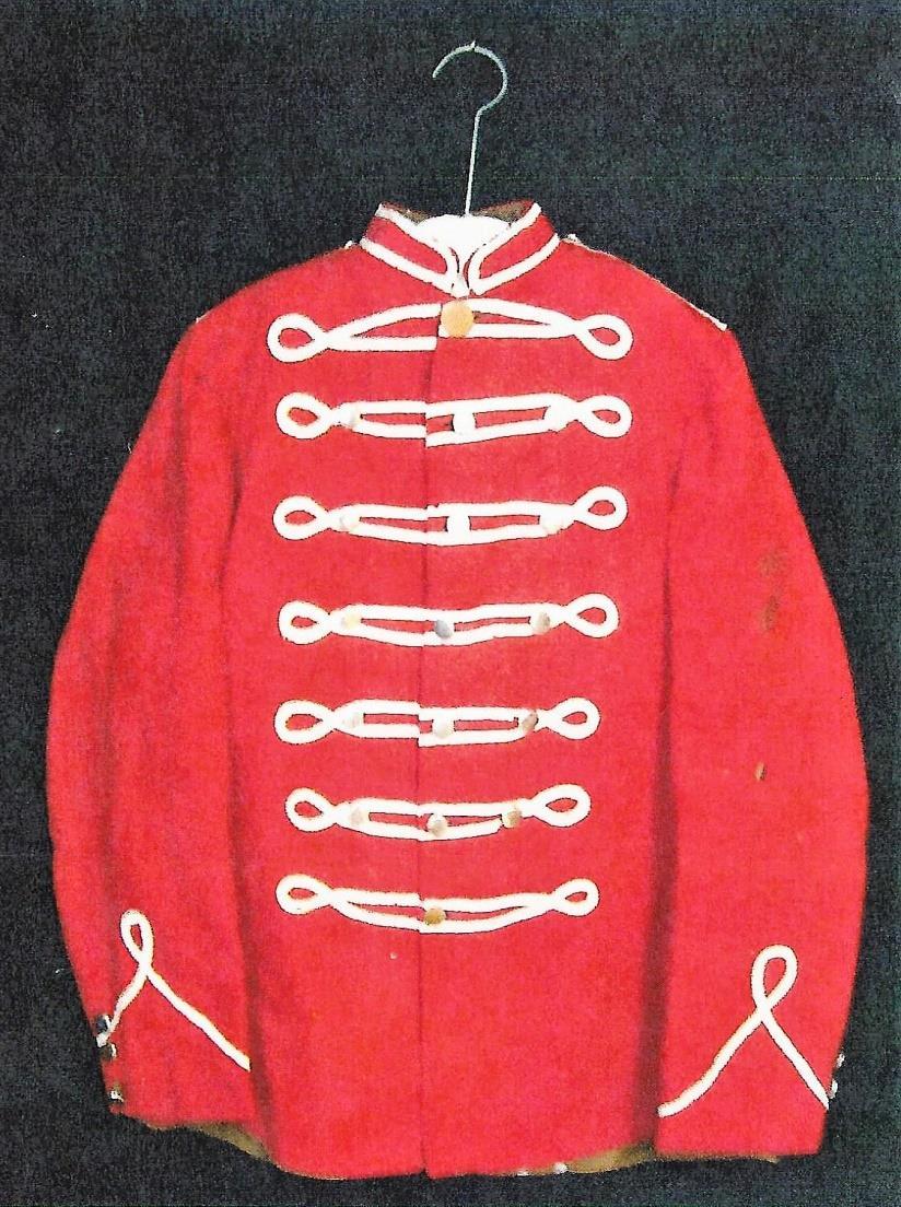 78 American Fork D. U. P. BAND JACKET This red band jacket of wool has brown cotton lining. The white trim is sewn in patterns of figure eights.