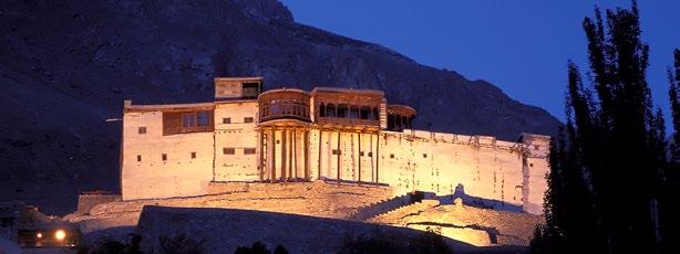 Shangri-La Hunza A journey to cultural landscapes set in awe-inspiring mountains Baltit Fort at dusk, Hunza Valley a Gilgiton home, the polo grounds, the mountain bazaar and the Buddha rock carving