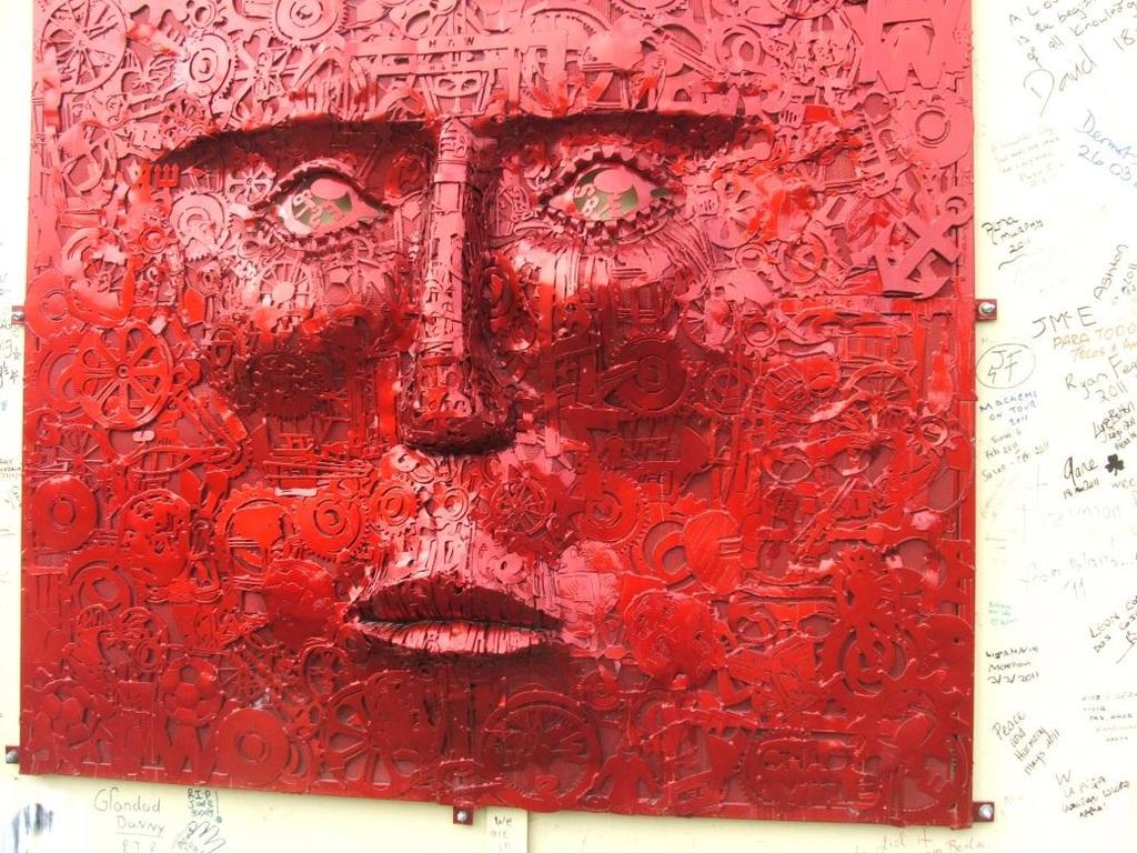 This sculpture is on one of the peace walls.