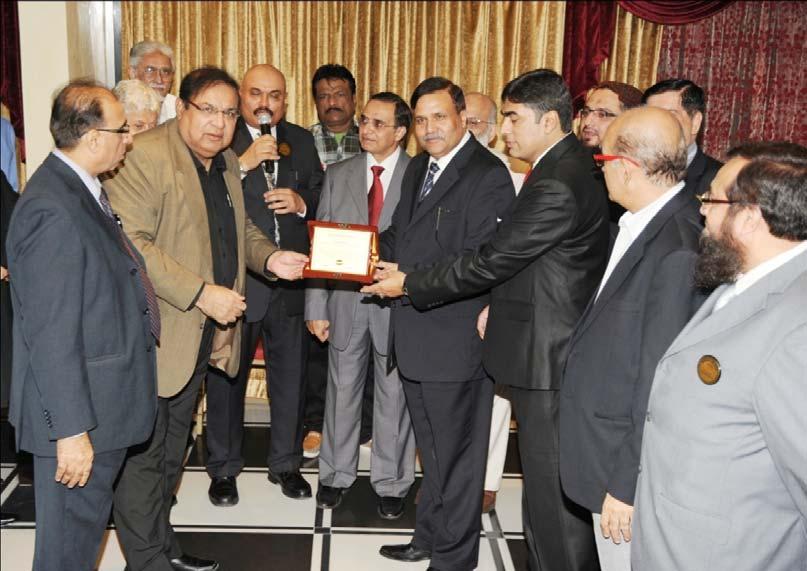 H.E.Consul General Pakistan being presented by Mr.
