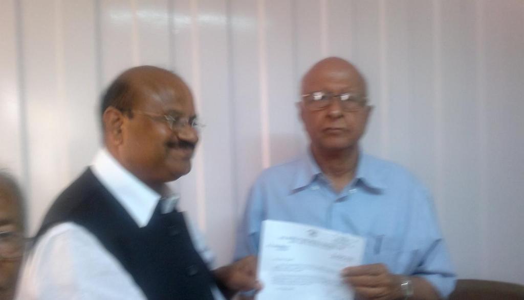 Dr.P.C.Rayulu obtaining the appointment orders as Vice Chairman, AICC Kisan Cell (AP) from Sri S.