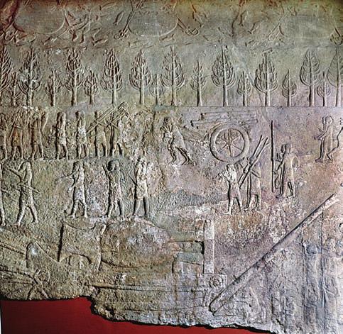 EmpirE s of AnciE nt mesopota mia This relief shows gangs of slaves moving a huge stone bull set on a sled to a building site. much larger and had several different temples.