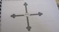 The Resurrection Cross symbolizes the new day which promises the forgiveness of our sins.