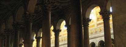 Peter s but with an oriented apse (in the east) and nave columns which support arches instead of an architrave. The façade pediment is decorated in mosaic.