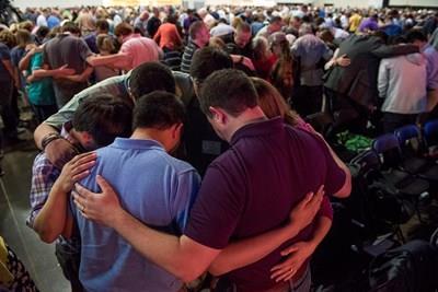 Small groups of messengers at the Southern Baptist Convention annual meeting June 16 were led by Ronnie Floyd, president of the SBC and pastor of Cross Church in Arkansas, in a prayer service.
