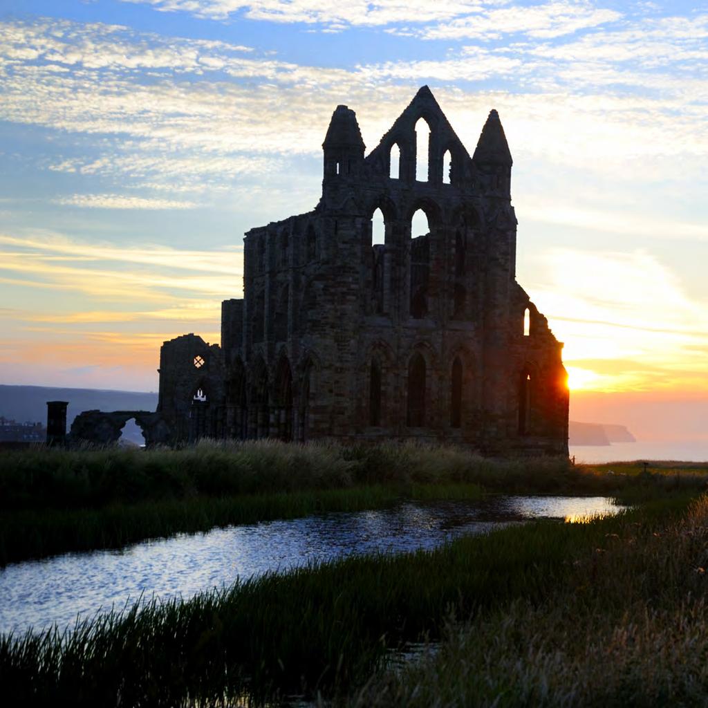 View of the abbey at sunset from across the pond.