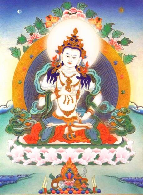 (2) The seed syllable inside the moon disc revolves and transforms into Vajrasattva. His body is white and he is adorned by a Five-Buddha Crown, celestial garments and ornaments.