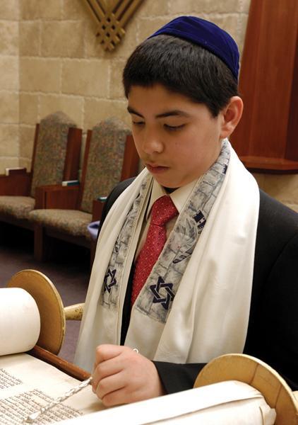 Chapter 12 Learning About World Religions: Judaism Section 1 Introduction This boy reads from the Torah during his bar mitzvah, a coming of age ceremony for Jewish children.