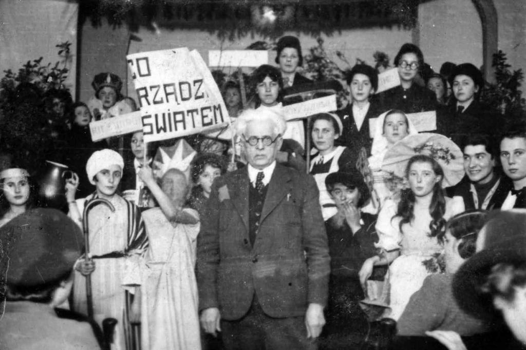 Children s theater performance with banner What rules the world, 1941 On Saturday, September 6, [1941] an event was organized by the Marysin administration in the hall of the cultural center under