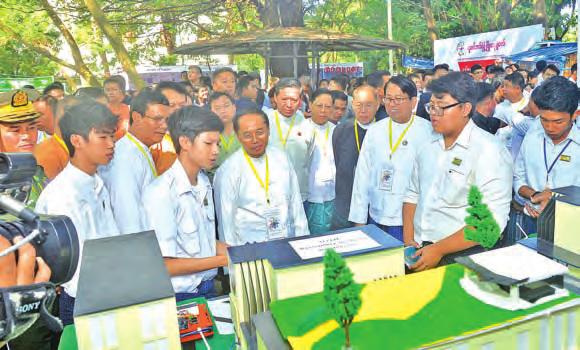 Minister Dr Pe Myint and officials visit the