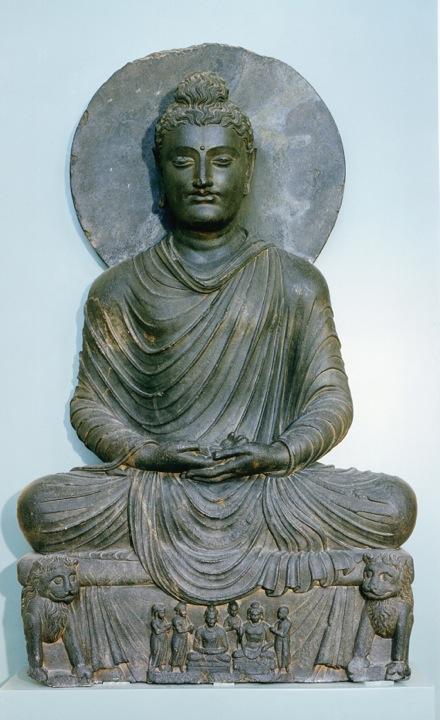 In Contrast The Gandharan Buddha, despite having many of the same attributes (the lion throne, the yogic posture and radiant nimbus) remains a mixture of Roman styles.