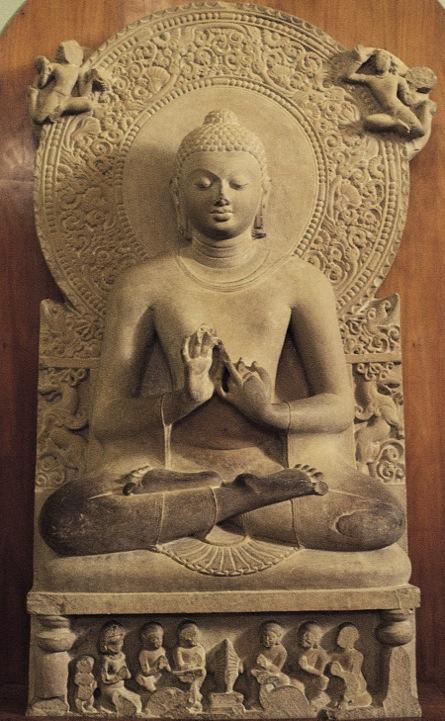 The Gupta Buddha is shown in the teaching mudra. No longer appearing heavy like the yaksha images, this is a person of great spiritual bearing.