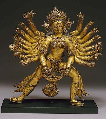 Why so many arms? Deities are frequently portrayed with multiple arms, especially when they are engaged in combative acts of cosmic consequence that involve destroying powerful forces of evil.