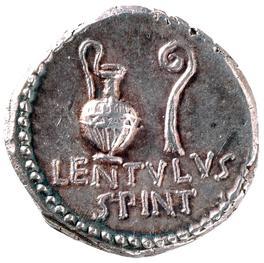 The reverse shows a jug and a lituus, the curved wand of an augur, traditionally symbols of Pietas, who stands for the devotion to tradition.
