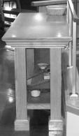 Offertory table - table in back of church where the bread and wine are placed. Credence table table on the main floor behind the sanctuary where vessels for mass are placed when not being used.