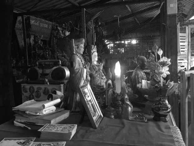 1.3 The statue of Guanyin on the table of a