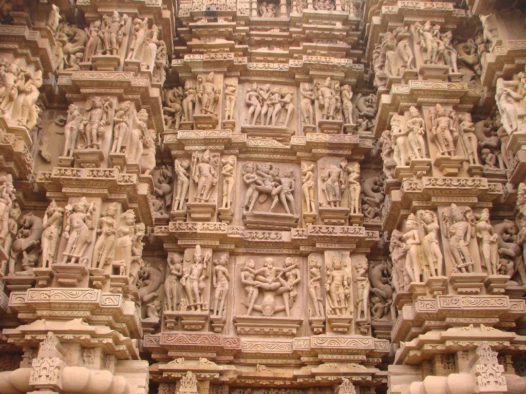 Kandariya Temple, Khajuraho, 1004-35CE The exterior figures are arranged in horizontal bands or friezes-a broad horizontal band of sculpted or painted decoration, especially on a wall near the
