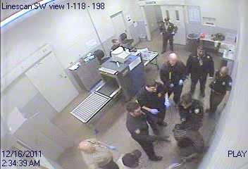 Page 7 Pictures from the jail s cameras show a mass of individuals, including Officers Hanlon and French, attacking Marty: Officers Hanlon