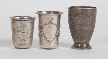 On the goblet sides is the form of a menorah and Stars of David (with the word Zion in their center, and the Hebrew letters of Magen David ), with dense geometrical ornamentation. Height: 9cm.