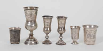 145 144 145. Silver Kabalistic Kiddush Goblets - Naharot Gan-Eden Five Naharot Gan-Eden Kiddush goblets made of silver (all stamped). Eretz Israel, mid 20th century.