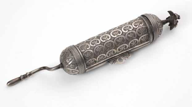 147 147. Megillat Esther with a Silver Case Balkan, 19th Century Megillat Esther with a case. [Balkan countries, 19th century]. Silver (unstamped), cast, hammered and engraved.