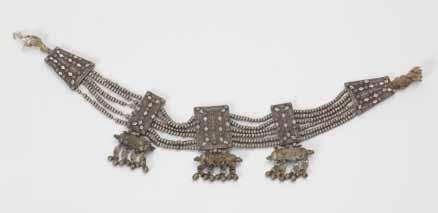 166 167 166. Yemenite Amulet-Pendant Filigree-Silver Amulet-pendant. Yemen,[End of 19th, beginning of 20th century]. Silver, filigree; silver beads; fabric threads.