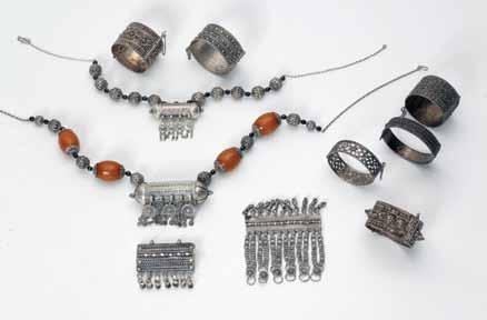פתיחה: $850 167. Yemenite Jewelry 13 pieces of jewelry. Yemen / Eretz Israel, [20th century]. Silver, filigree. Some are stamped.