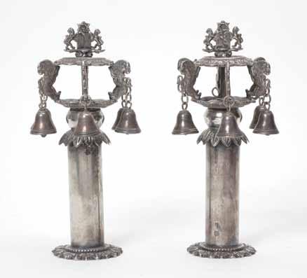 69 69. A Pair of Torah Finials Lvov, 19th Century Torah finials. Lvov, 19th century. Sawn impressed silver.