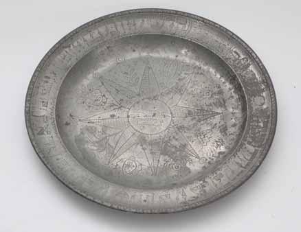 124 123 124. Pewter Passover Seder Plate Moses in the Basket Germany Passover Seder plate. Germany, [end of 19th century or beginning of 20th century]. Cast engraved pewter.