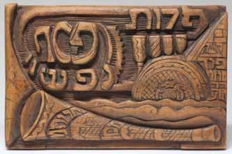 133 134 134. P dut Nafsheinu Wooden Board for Passover P dut Nafsheinu (Redemption of Our Souls), decorative board for Passover. [Place unknown, mid 20th century]. Carved wood.