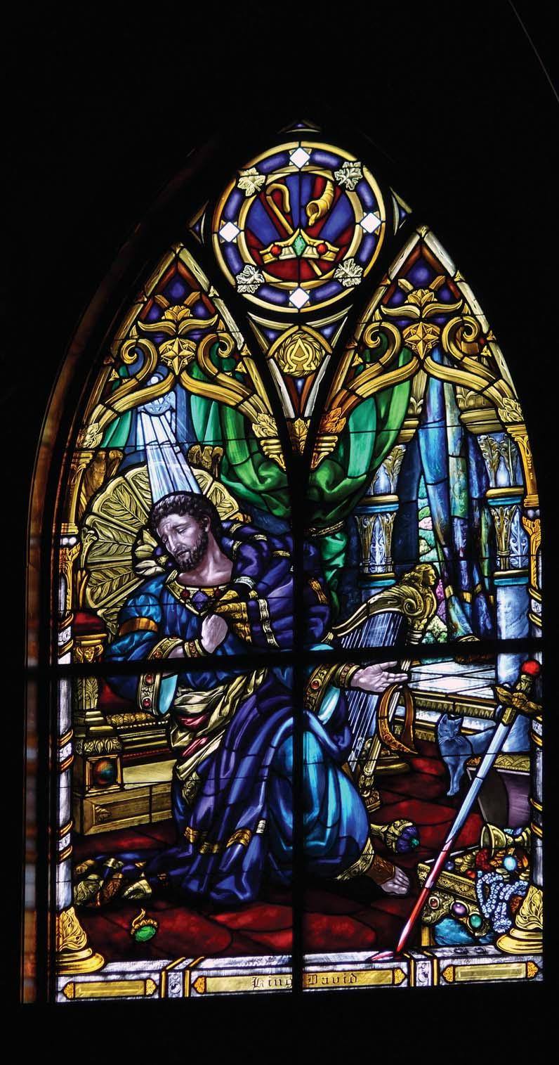 adultery with Bathsheba. This window presents symbols of wealth in the gold and jewels, of power in the king s scepter, of violence in the bloody sword, and of lust in the black cat.