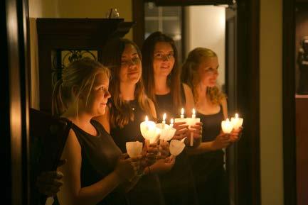 The last Sunday evening Masses of each semester are candlelight