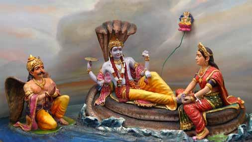 Lord Vishnu reclining on the powerful coiled serpent,