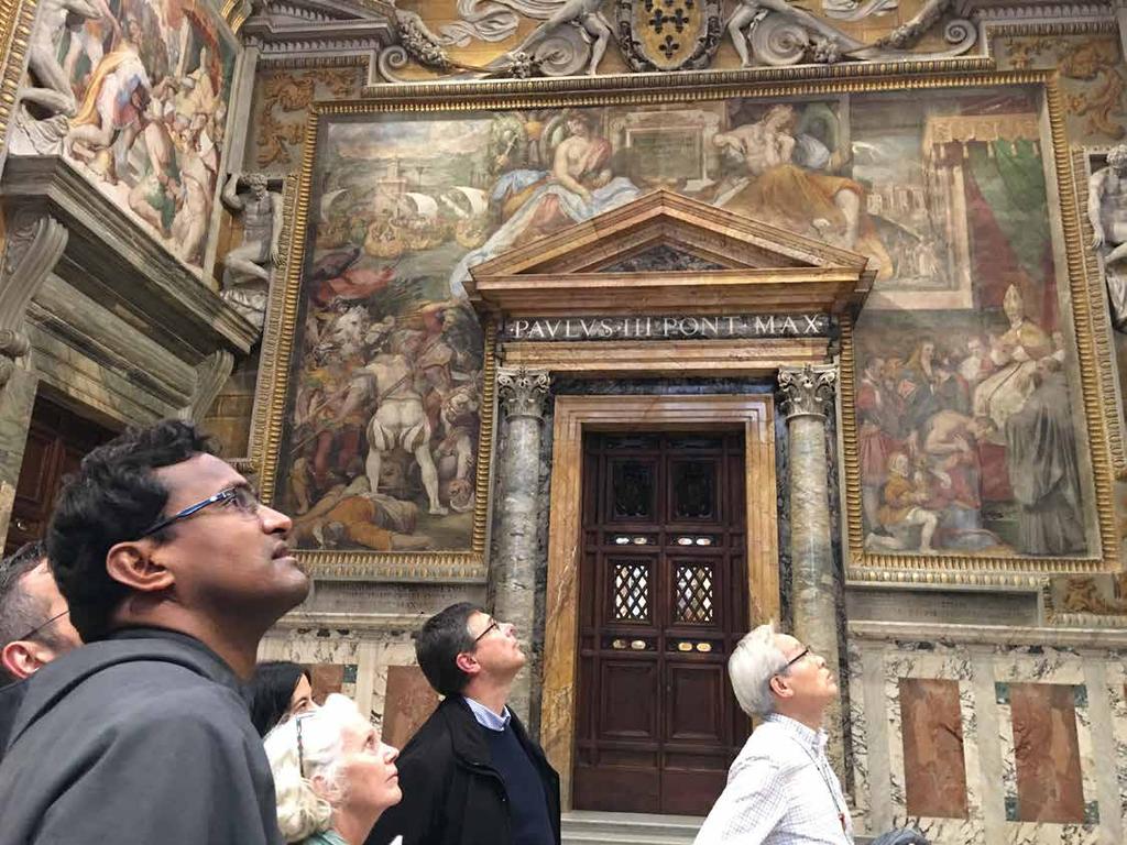 Members of the CIOFS Presidency take in the breathtaking view of art in the Hall of Kings in the Vatican s Apostolic Palace. FROM LEFT: General Spiritual Assistant Alfred Parambakathu, OFM Conv.