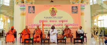 Hosts Vishwakarma saints for a 3-day conference Bengaluru, Karnataka, India, May 5 Attends