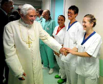 Pope Benedict XVI thanks staff as he leaves hospital with a