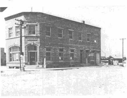 150 HISTORY OF DUCHESNE COUNTY This building housed the Myton Bank, Opera House and Myton Free Press, circa 1920.