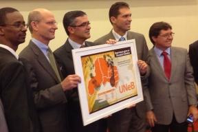 Adventist Church President Ted N. C. Wilson and South American Division President Erton Köhler, second and third from left, pose with map showing May.