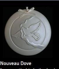 This is another version of the beautiful dove ornament that started our yearly Christmas ornament sales in 2013.