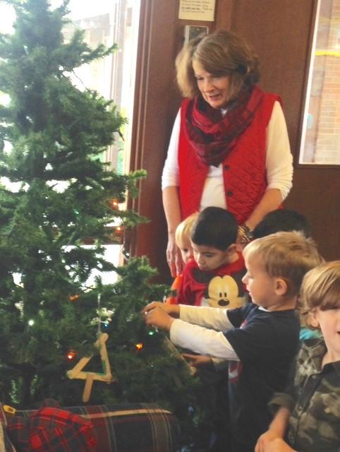 Landon Swartz decorates the School Christmas Tree. Preschool News We started the Christmas Season off in a bright and merry way here in the Preschool.