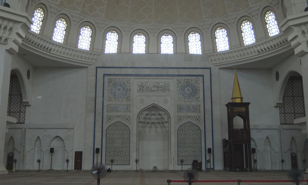of visitors. There are fourteen other smaller and simpler Mihrabs on the Qibla wall. They are arranged in various series on both sides of the main Mihrab. Figure 7.