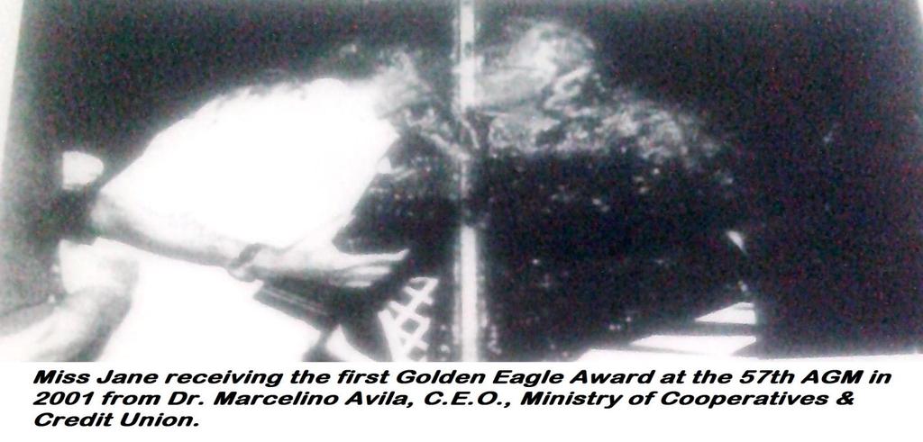 On April 25, 2001 HRCU presented Miss Jane its Golden Eagle Award at the 57 th Annual General Meeting for her outstanding service to the Belize Credit Union Movement.