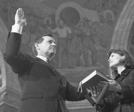 High Office Mike Leavitt is sworn in for his second term as governor of Utah in 1997. A member of the Latter-day Saints, Leavitt is one of a majority of Mormons holding high offices in the state.