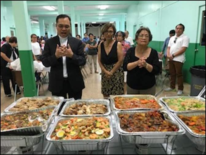 TOP: Monsignor Jonas Achacoso blessing the food at