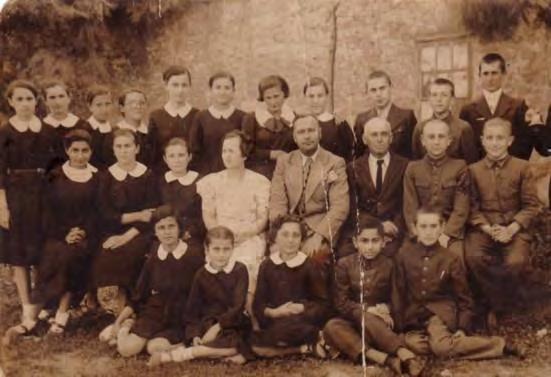 the students were mostly Jewish, they tried not to speak Yiddish, so as not to be sent to a corner, stay on their knees or get hit with a stick on the hands.
