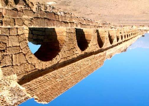 They call it an "aqueduct." The word this time is from Latin, "aqua" meaning water and "ductus" meaning "leading.