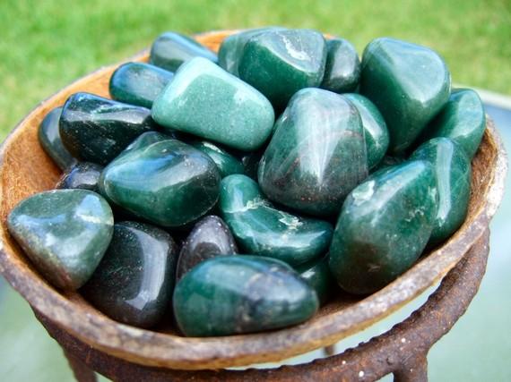 You did it! Not so tough, right? Crystals that support abundance & prosperity Green aventurine This is a type of quartz that grows in masses. You'll often find them as tumbled stones.
